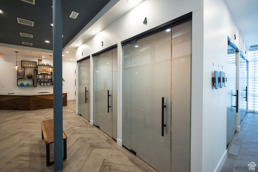 Hallway featuring elevator