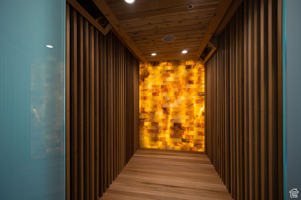 Hall featuring recessed lighting, elevator, wood ceiling, and light wood-type flooring