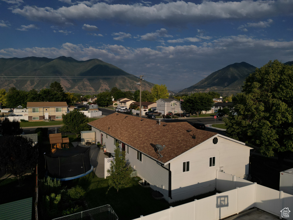 View of mountain background featuring nearby suburban area