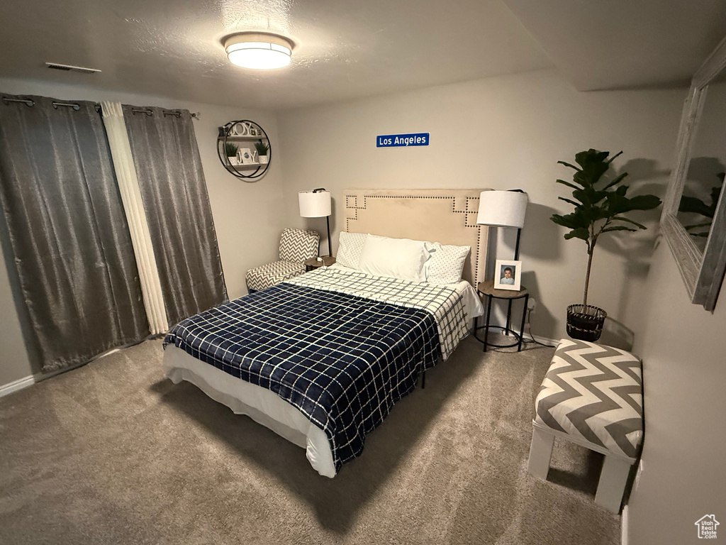 Bedroom featuring carpet