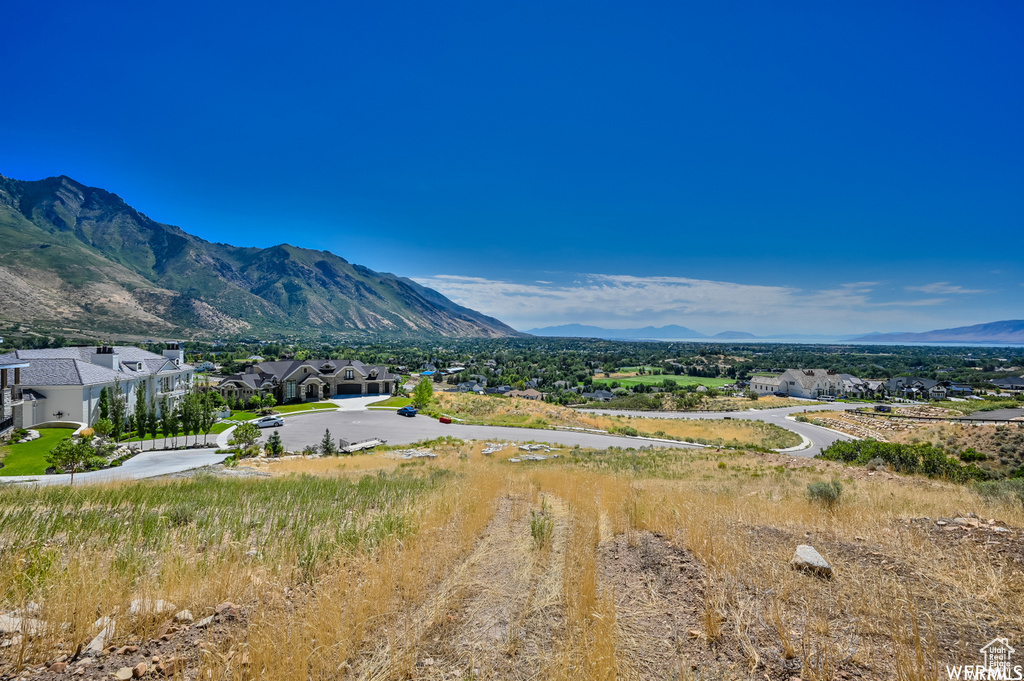 Mountain view featuring nearby suburban area