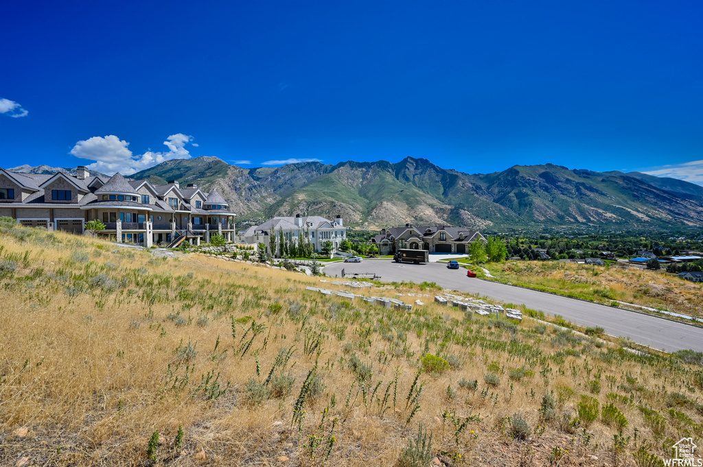 View of mountain backdrop with nearby suburban area
