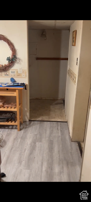 Hall with light wood-type flooring