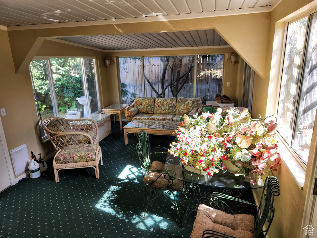 Sunroom featuring healthy amount of natural light