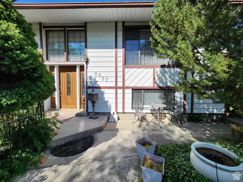 Back of property featuring a porch