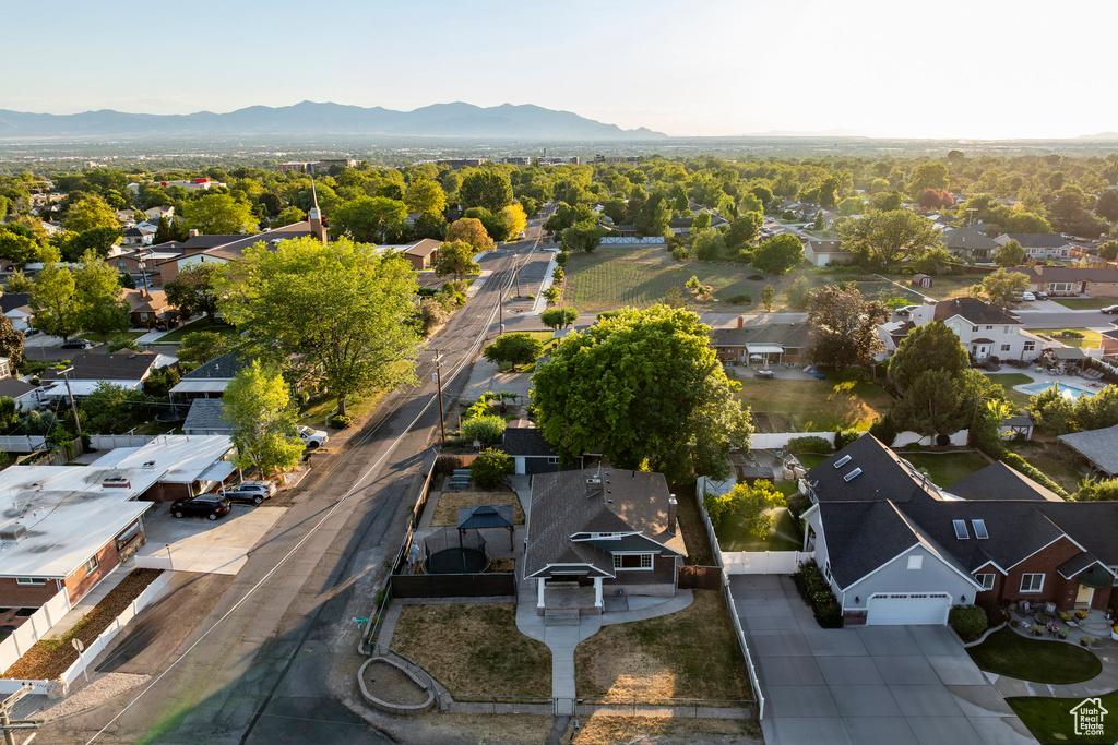 Aerial view of residential area with a mountain backdrop