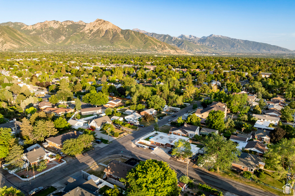 Aerial view of residential area with a mountainous background