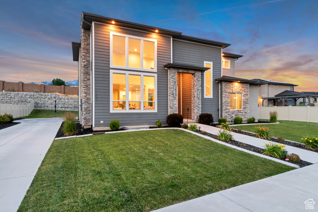 Contemporary home with stone siding