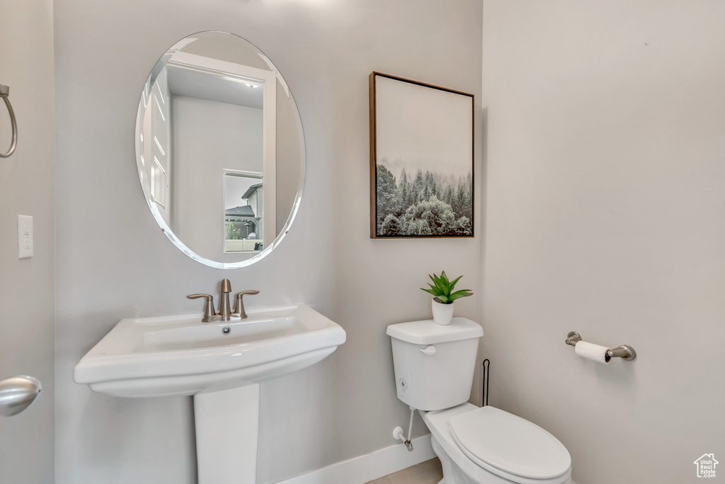 Bathroom with toilet and a sink