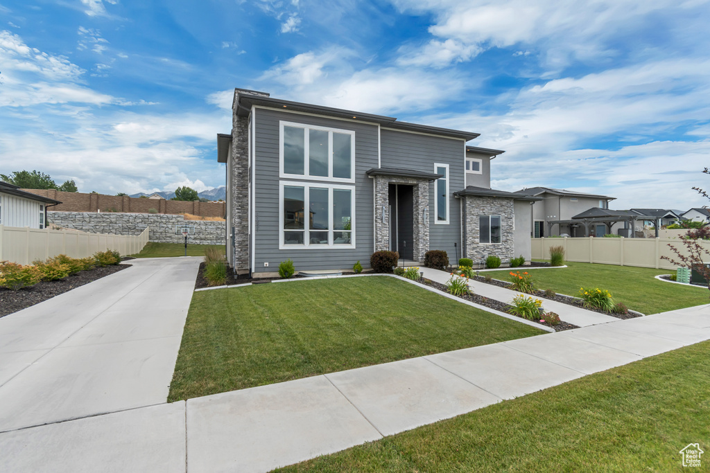 Contemporary house with stone siding