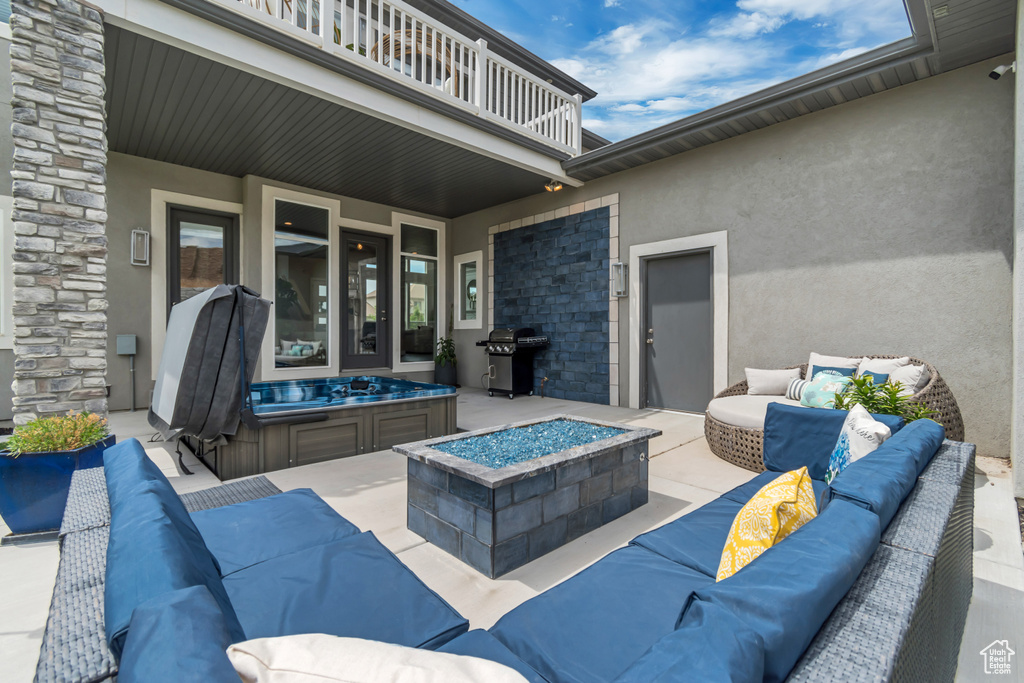 Patio / terrace featuring an outdoor living space with a fire pit, a patio area, and grilling area