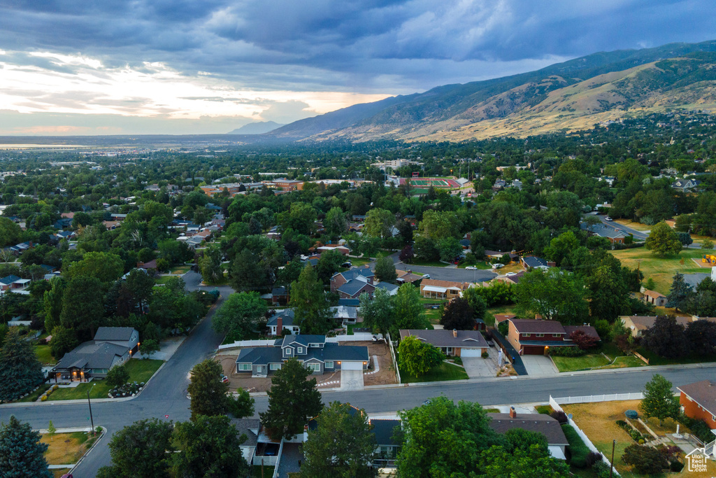 Aerial view at dusk of a mountain view and a residential view