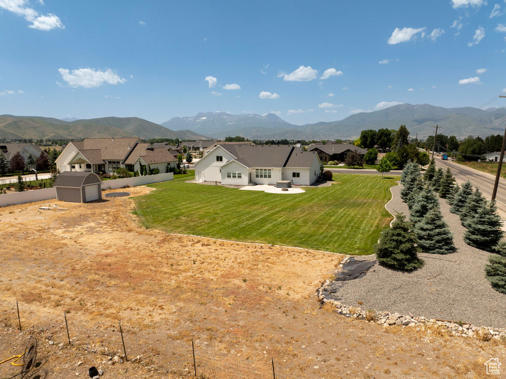 Mountain view featuring nearby suburban area
