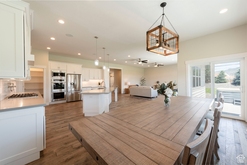 Dining room featuring recessed lighting, wood finished floors, and ceiling fan