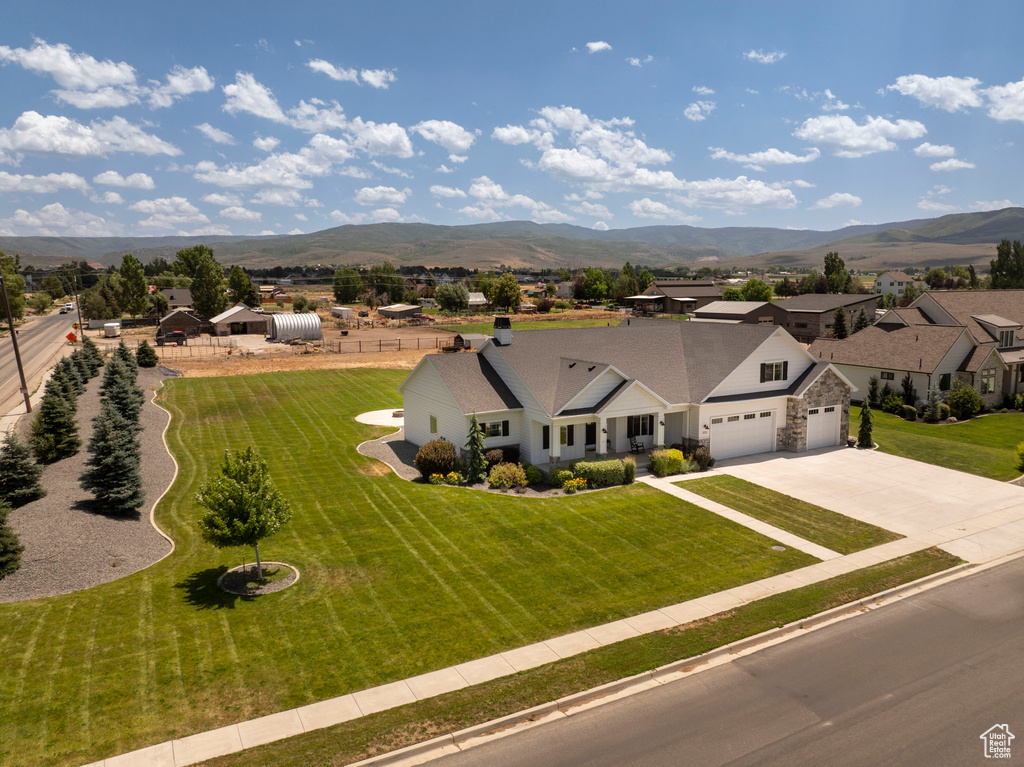 View of subject property with a mountainous background