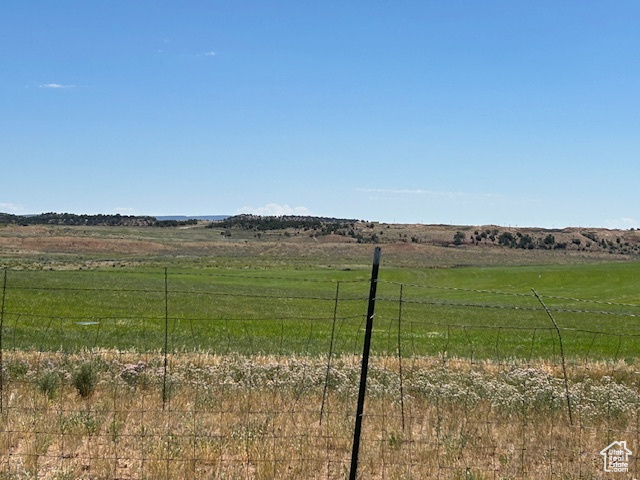 View of yard with a view of rural / pastoral area