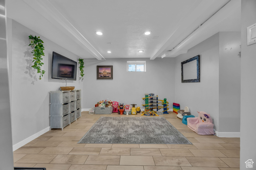 Playroom featuring recessed lighting and wood finish floors