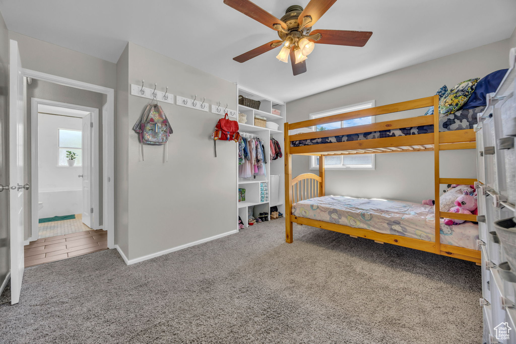 Bedroom featuring carpet and a ceiling fan