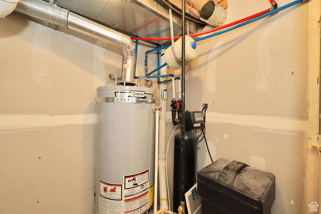 Utilities featuring strapped water heater