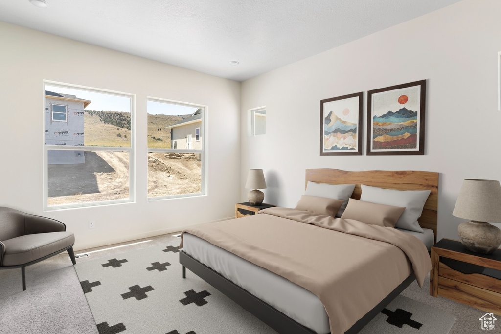 Bedroom with carpet flooring