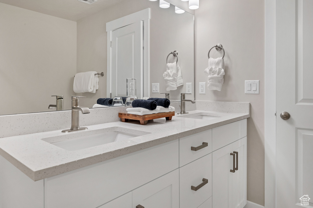 Full bathroom with double vanity