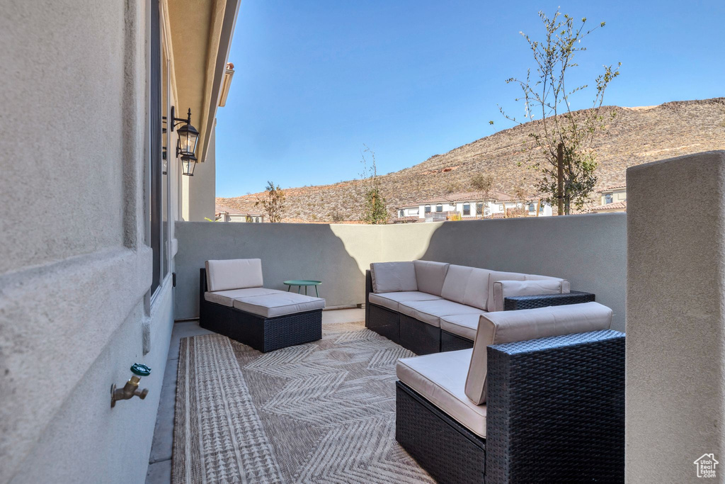 Patio / terrace with a mountain view and an outdoor hangout area