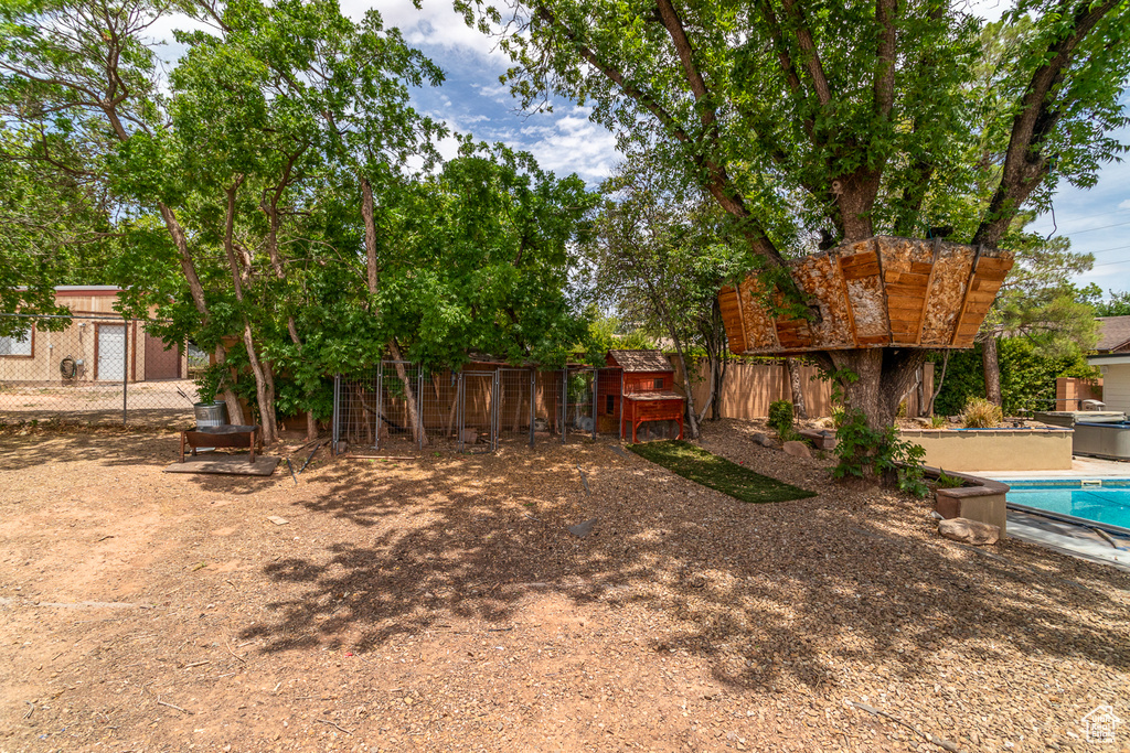 View of fenced backyard