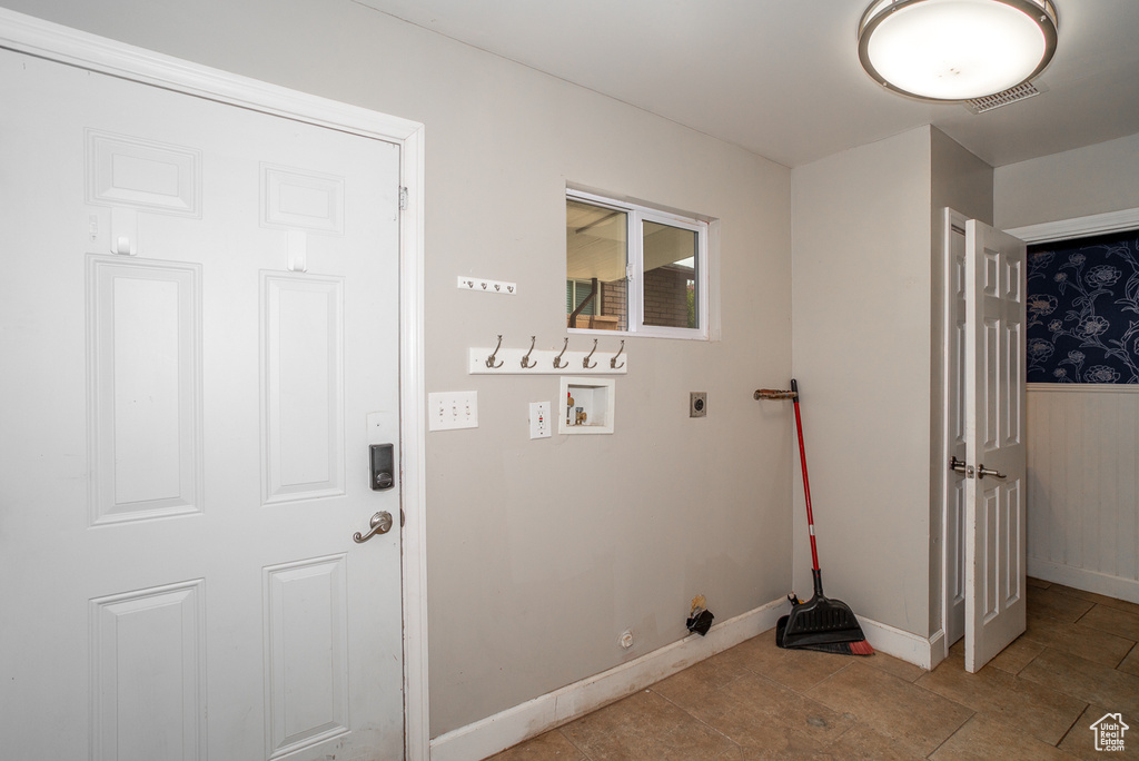 Washroom featuring hookup for a washing machine, gas dryer hookup, and hookup for an electric dryer