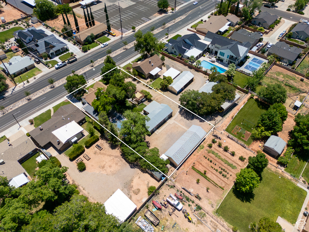 View of property location with property boundaries highlighted and a pool area