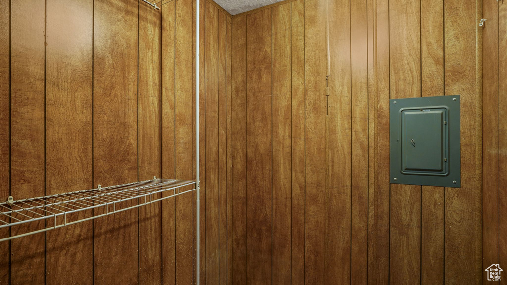 Detailed view of wooden walls and electric panel