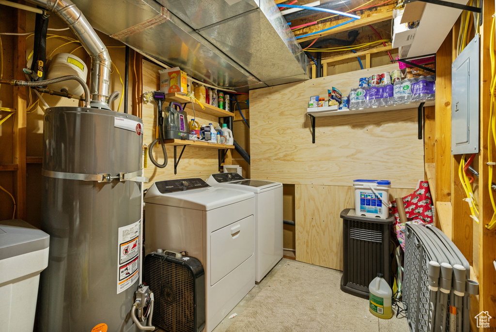 Washroom featuring water heater, independent washer and dryer, electric panel, and light colored carpet