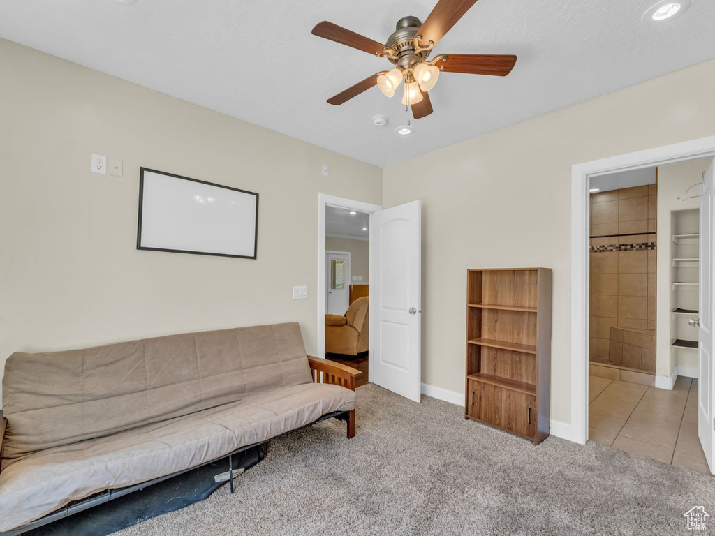 Sitting room with ceiling fan, carpet flooring, and recessed lighting