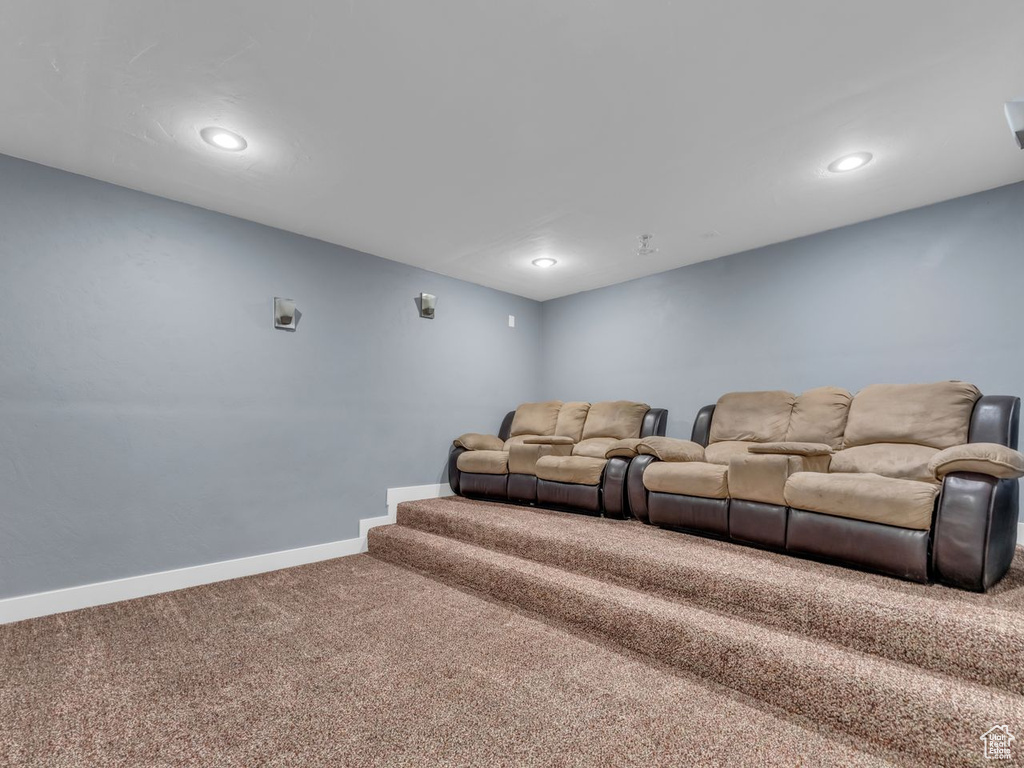 Home theater room featuring carpet floors and recessed lighting