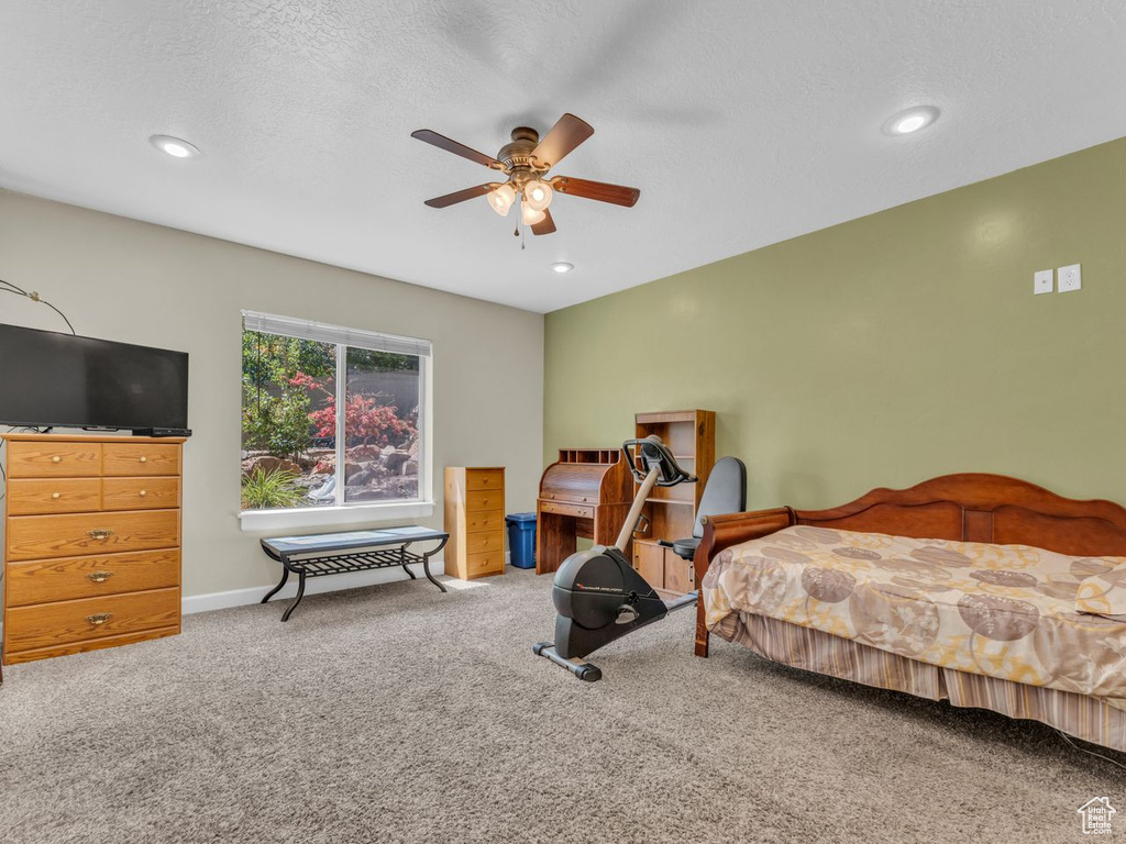 Bedroom with carpet flooring, recessed lighting, and ceiling fan