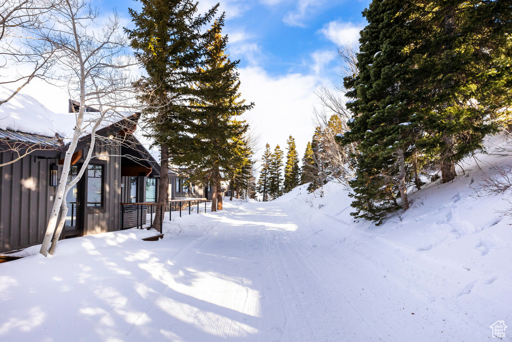 View of yard layered in snow