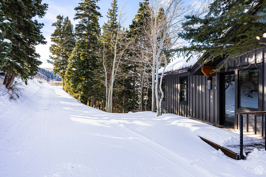 View of yard layered in snow