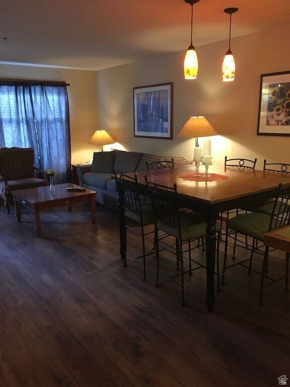 Dining area featuring wood finished floors