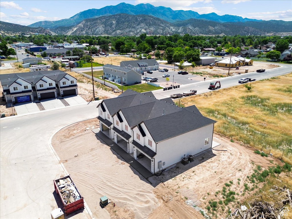 View of subject property featuring mountains