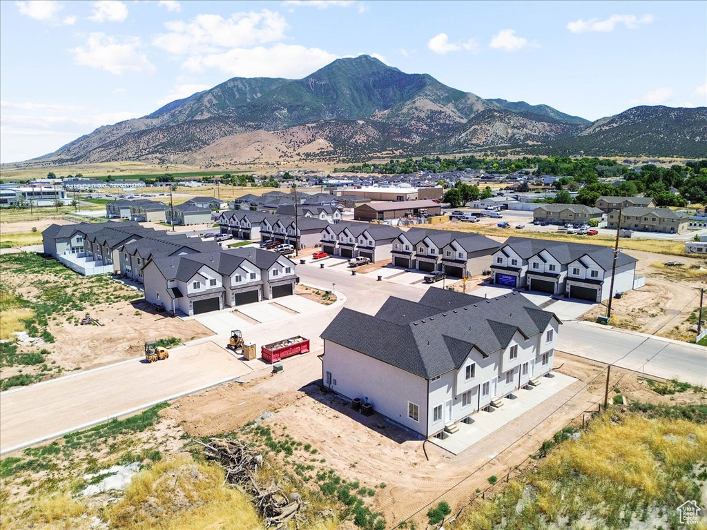 Aerial view of residential area featuring mountains