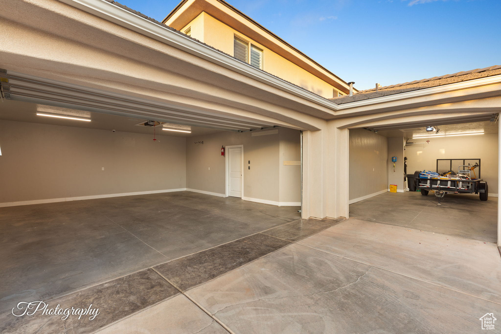 Garage with concrete driveway