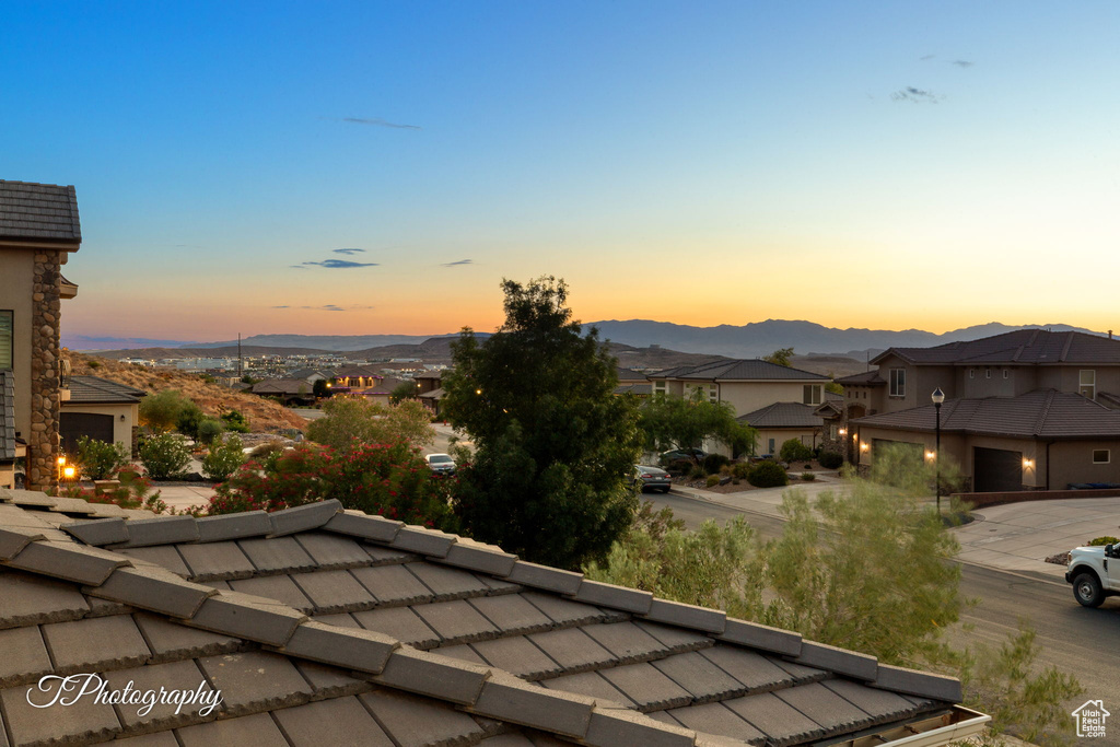 View of mountain background featuring nearby suburban area
