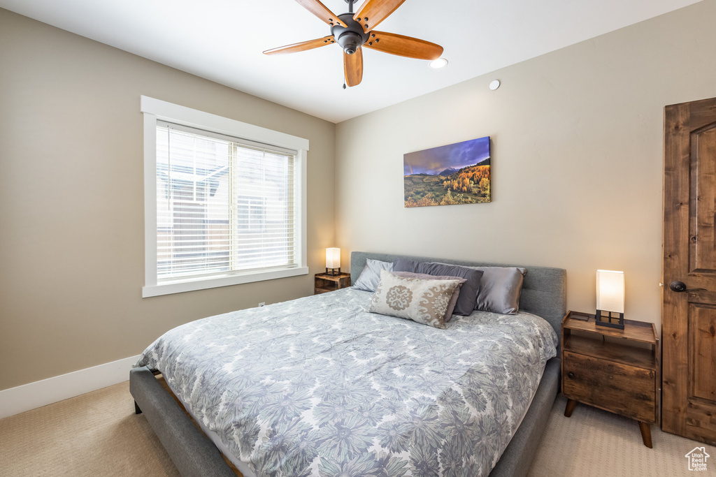 Bedroom featuring carpet floors and ceiling fan