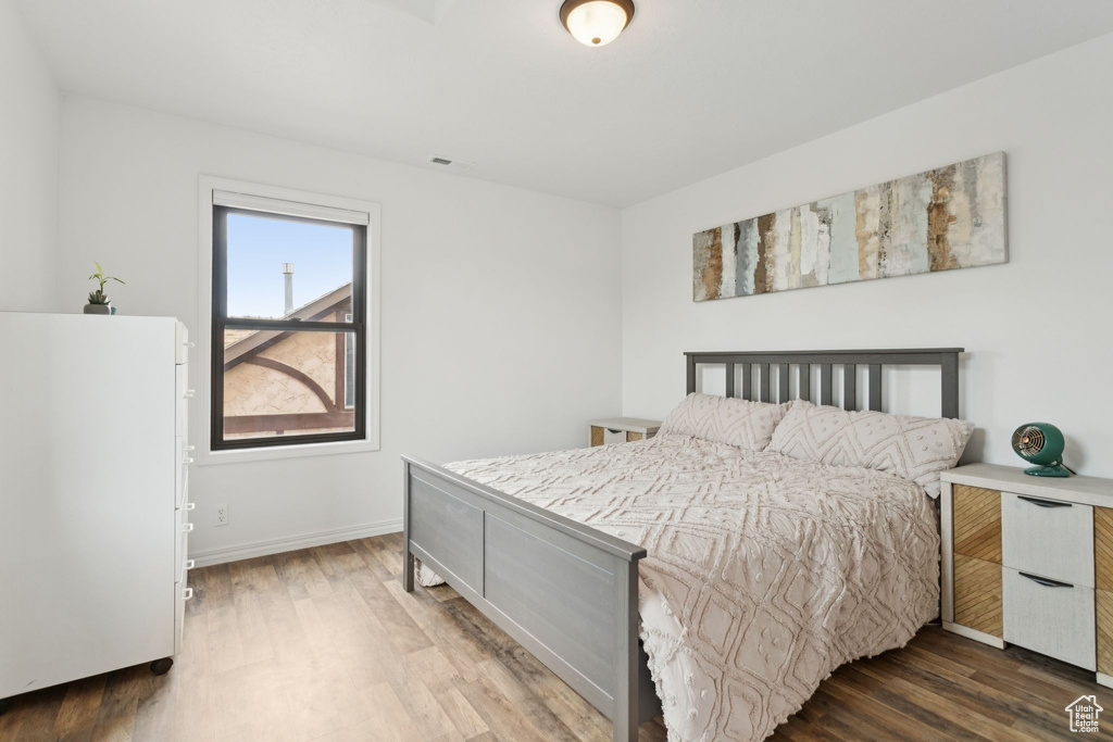 Bedroom featuring wood finished floors