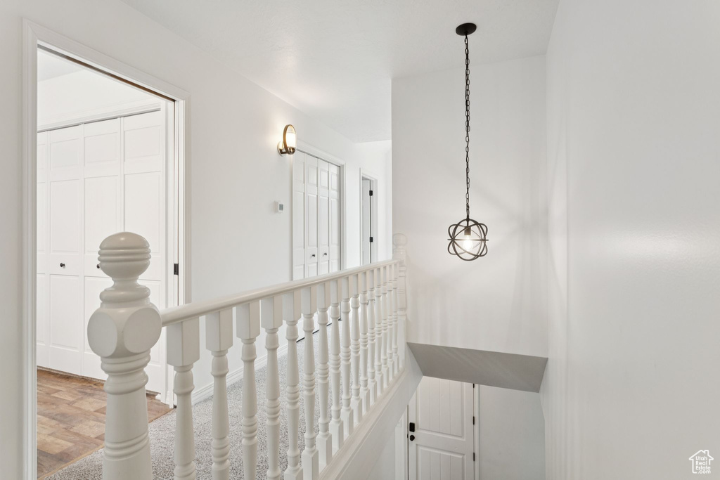 Corridor with wood finished floors