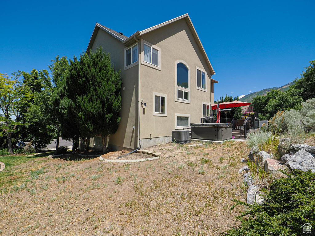 Back of property with stucco siding