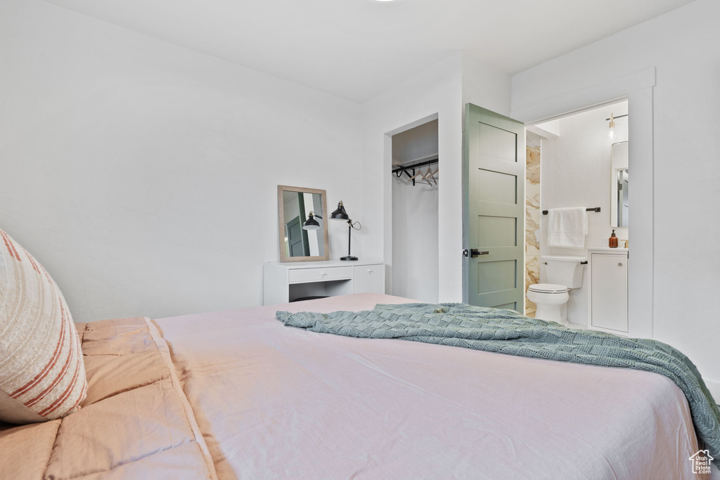 Bedroom featuring ensuite bathroom
