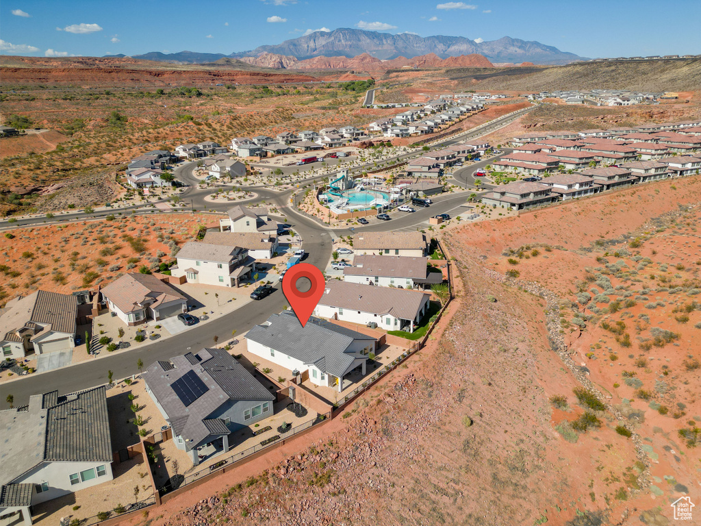 View of property location with nearby suburban area and mountains