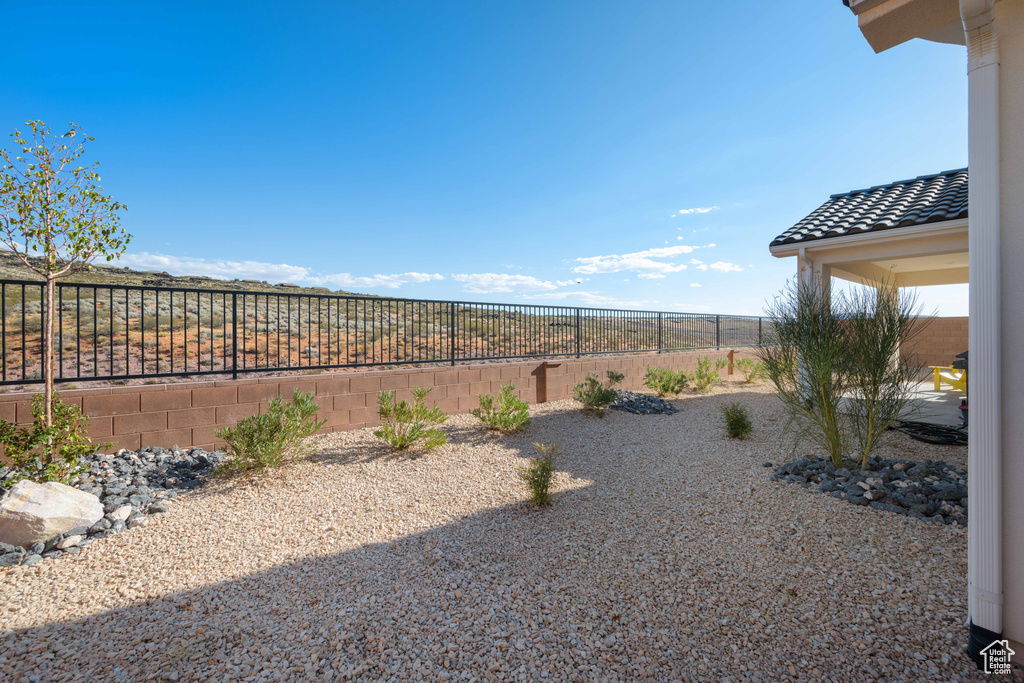 View of fenced backyard