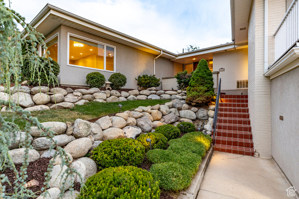 View of yard featuring stairway