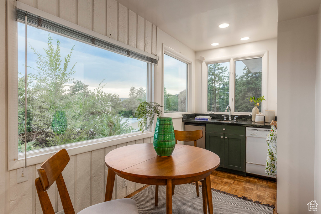 Dining space with plenty of natural light and recessed lighting
